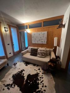 Giường trong phòng chung tại Appartamento incantevole con box e ski room, Wi-Fi, Bormio