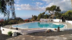 Bazén v ubytování La Hacienda BuenVivir - Apartamentos nebo v jeho okolí