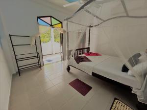 Postel nebo postele na pokoji v ubytování La Villa