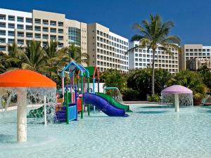 a playground in the water in a resort at Grand Luxxe with free Golf in Nuevo Vallarta 