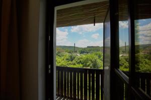 a view from a window of a balcony at Apartments Panorama in Veliko Tŭrnovo
