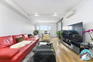 Et sittehjørne på Aircabin - Burwood - Sydney - 2 Beds Apt Free Park