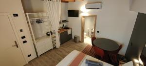 Kuchyň nebo kuchyňský kout v ubytování ANNAMA Coliving