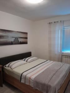 Postel nebo postele na pokoji v ubytování Villa Kutija