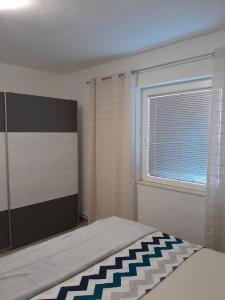 Postel nebo postele na pokoji v ubytování Villa Kutija