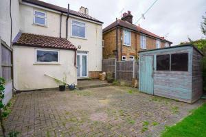an empty yard with a house and a shed at 3 Bedroom Home in the Dale’s, Very close to Ipswich town centre. in Whitton