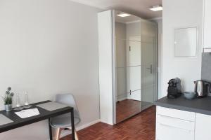 Η κουζίνα ή μικρή κουζίνα στο Hometown-Apartments
