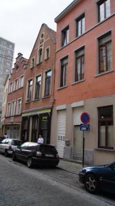 a black car parked on a street next to buildings at B&B La Villa Zarin in Brussels