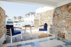 Posedenie v ubytovaní Minos Imperial Luxury Beach Resort & Spa Milatos