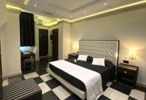 Voodi või voodid majutusasutuse BHB Hotel toas