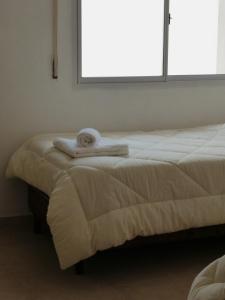 Llit o llits en una habitació de Habano Apart