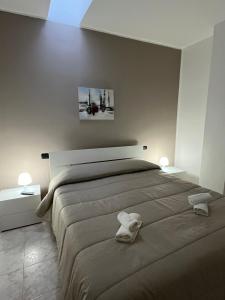 Postel nebo postele na pokoji v ubytování Sidella home + 14 fotografií