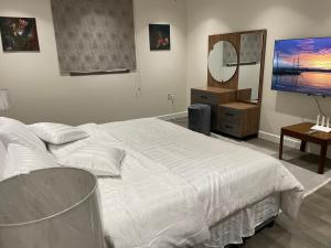Una cama o camas en una habitación de شقة عائلية خاصة
