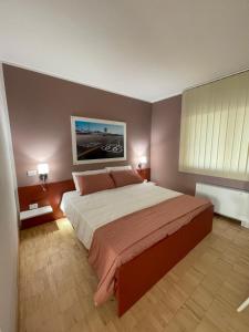 Postel nebo postele na pokoji v ubytování Motel Vespucci