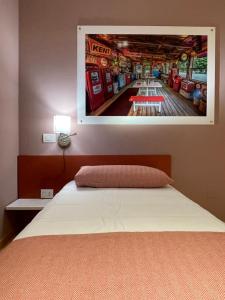 Postel nebo postele na pokoji v ubytování Motel Vespucci