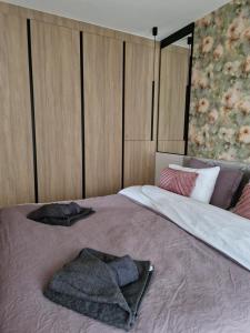 Postel nebo postele na pokoji v ubytování Apartment Ornament Lux + 3 fotografie