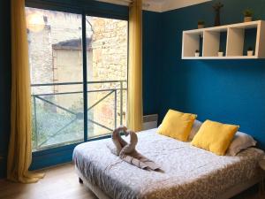 Ένα ή περισσότερα κρεβάτια σε δωμάτιο στο BnGo I Le Cosy I 2 personnes, Gare Perrache, Place Bellecour, Hypercentre Lyon