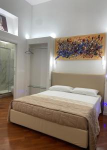 Postel nebo postele na pokoji v ubytování Falìkrjda Suite & Rooms