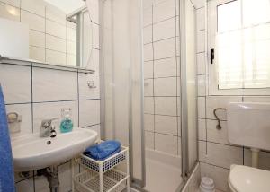 Koupelna v ubytování Apartment Vucic + 25 fotografií