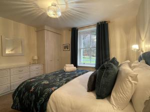 Llit o llits en una habitació de Lake View Cottage