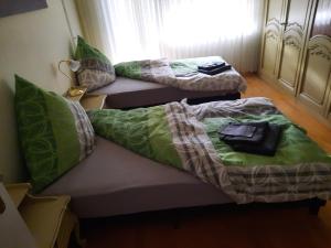 Postel nebo postele na pokoji v ubytování Monteurwohnung Niddatal, 25 km bis Frankfurt am Main