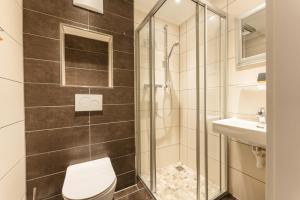 A bathroom at Toni`s Appartement by Schladming-Appartements