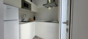 Kuchyň nebo kuchyňský kout v ubytování Sabbia Suite Casa Jalofa + 11 fotografií
