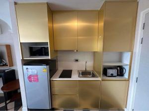 Kuchyň nebo kuchyňský kout v ubytování España Condo Resort Pattaya