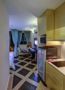 Kuchyň nebo kuchyňský kout v ubytování España Condo Resort Pattaya