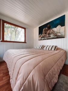 Una cama o camas en una habitación de La Casa de Owen