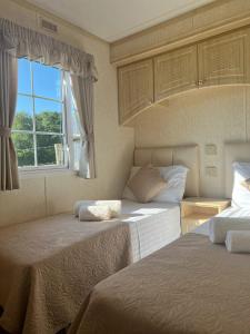 Katil atau katil-katil dalam bilik di Heavenly Retreat