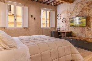 Ліжко або ліжка в номері Truffle House Tuscany Tuber Albidum Pico