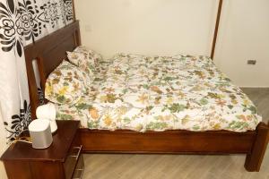 Łóżko lub łóżka w pokoju w obiekcie Morris Multi