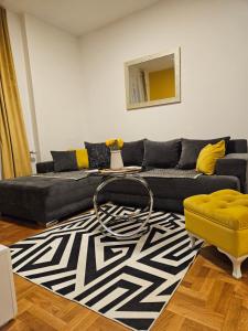 Posezení v ubytování APARTMAN SUNFLOWER