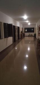 a large empty room with a large white floor at Brookefield Service Apartment in Bangalore