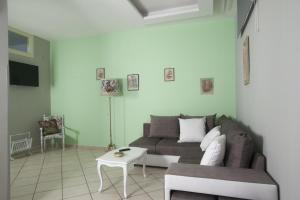 Televízia a/alebo spoločenská miestnosť v ubytovaní City Pompei Accommodations