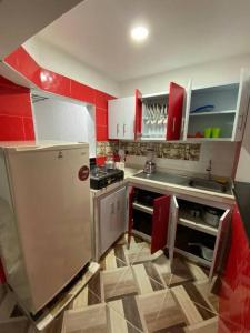 Kuchyň nebo kuchyňský kout v ubytování Apartamento familiar o personal