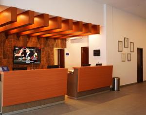 TV a/nebo společenská místnost v ubytování Park Inn by Radisson Mazatlan