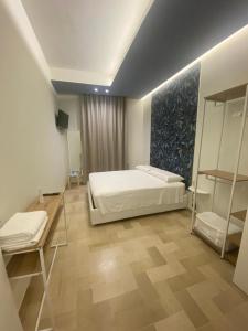 Postel nebo postele na pokoji v ubytování Apulia 35