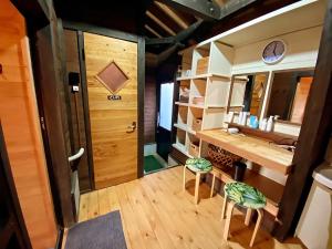 Foto sihtkohas Minamioguni asuva majutusasutuse 黒川温泉から車で10分、阿蘇一望の貸切サウナ&一棟貸切宿【Deepspot】 galeriist