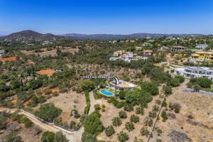 an aerial view of a resort property with a pool at Villa Casa do Barrocal by Villa Plus in Loulé