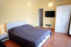 Voodi või voodid majutusasutuse Rooms Carija toas