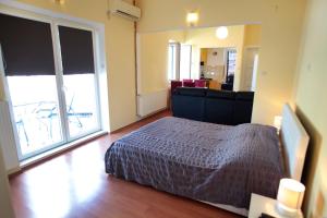 Voodi või voodid majutusasutuse Rooms Carija toas