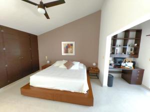 Postel nebo postele na pokoji v ubytování Casa Serena