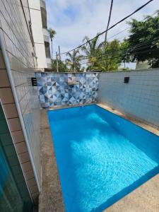 Swimmingpoolen hos eller tæt på Casa da Praia à 300 mts do Mar e Piscina Privativa