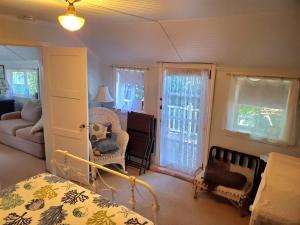 Χώρος καθιστικού στο Bay Cottage Getaway +14 φωτογραφίες