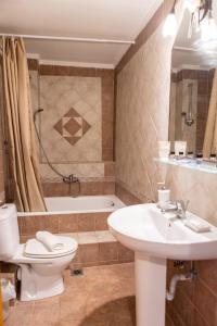 A bathroom at Xenia Palace luxury apartments