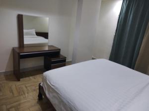 Postel nebo postele na pokoji v ubytování Mira Suite