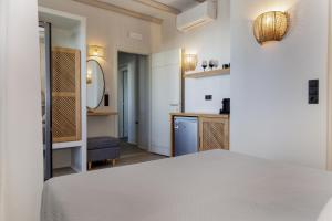 Katil atau katil-katil dalam bilik di Aesthete Suites
