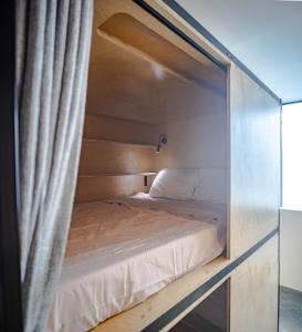 Postel nebo postele na pokoji v ubytování Haven Coliving